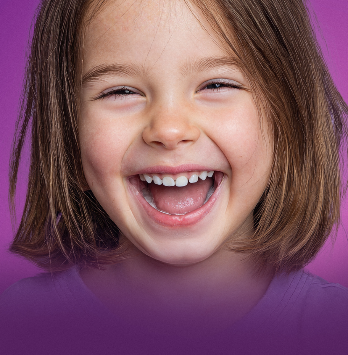 A laughing young girl.